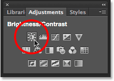 Clicking the Brightness/Contrast icon in the Adjustments panel. Image © 2015 Steve Patterson, Photoshop Essentials.com