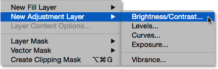 Choosing a new Brightness/Contrast adjustment layer from under the Layer menu. Image © 2015 Steve Patterson, Photoshop Essentials.com