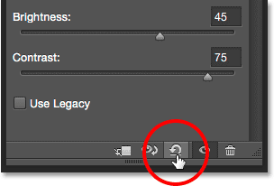 The Reset icon for the Brightness/Contrast adjustment layer in the Properties panel. Image © 2015 Steve Patterson, Photoshop Essentials.com