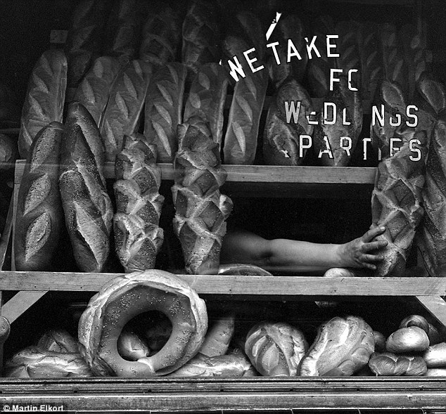 This shot taken by Elkort shows loaves of bread filling up the window of an Italian bakery