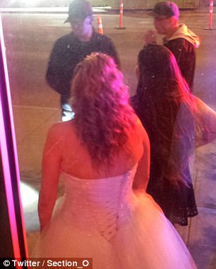 Police officers chat with the bride and a wedding guest