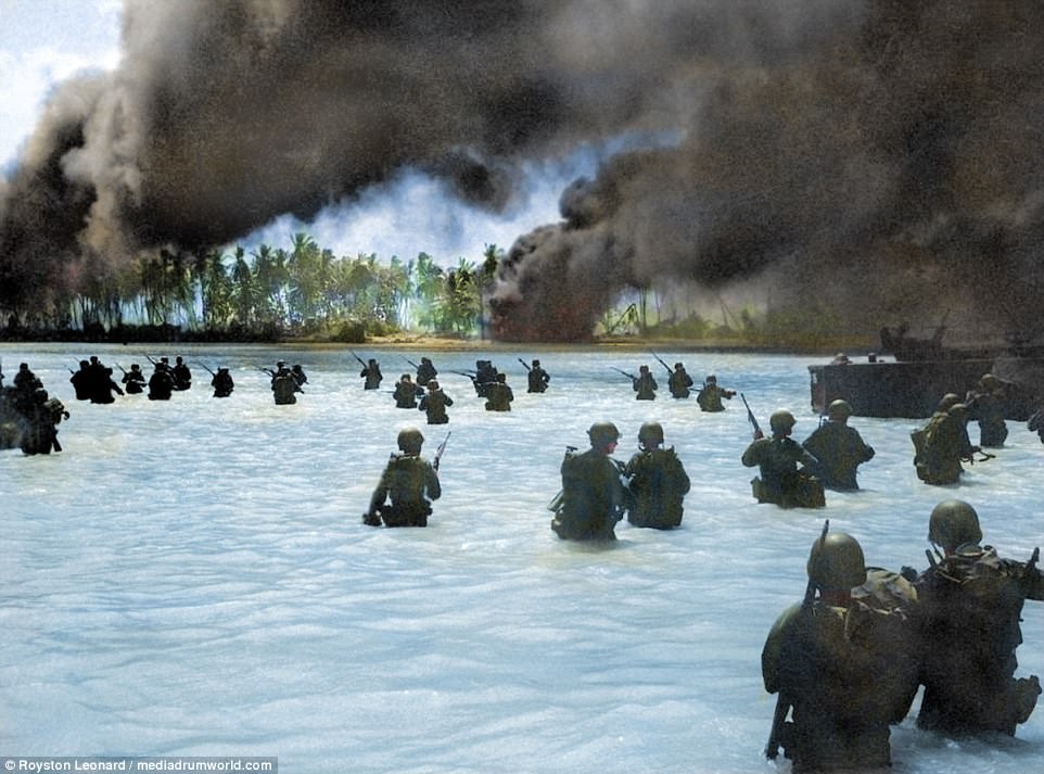 165th Infantry assault wave attacking Butaritari, Yellow Beach Two, find it slow going in the coral bottom waters. Japanese machine gun fire from the right flank makes it more difficult for them. The US paid a heavy price for their victory in Tarawa, with more than 1,000 killed and a further 2,000 wounded.