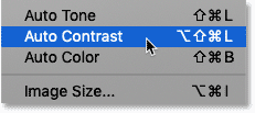 Selecting the Auto Contrast command in Photoshop