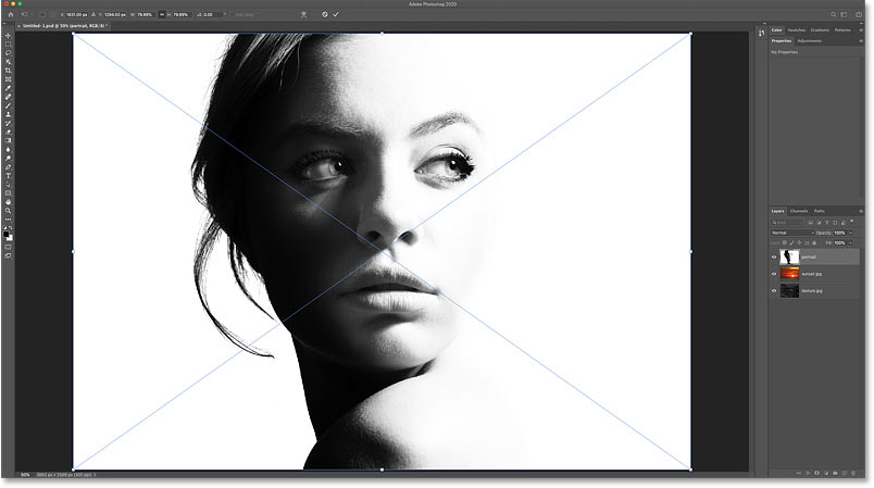 Photoshop opens the Free Transform command before placing the image into the document