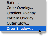 Choosing Drop Shadow from the list of layer styles. 