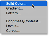Choosing a Solid Color fill layer. 