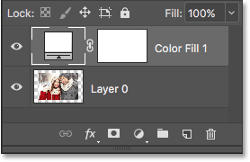 The Layers panel showing the fill layer above the image. 