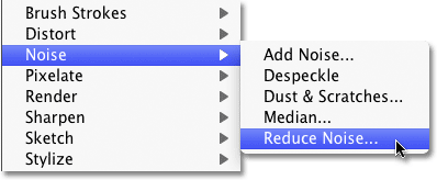 Selecting the Reduce Noise filter in Photoshop. Image © 2010 Photoshop Essentials.com
