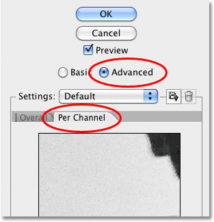 Selecting the Advanced options for the Reduce Noise filter in Photoshop. Image © 2010 Photoshop Essentials.com