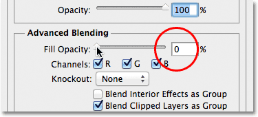 Lowering the Fill Opacity option to 0% in the Layer Style dialog box. Image © 2012 Photoshop Essentials.com.