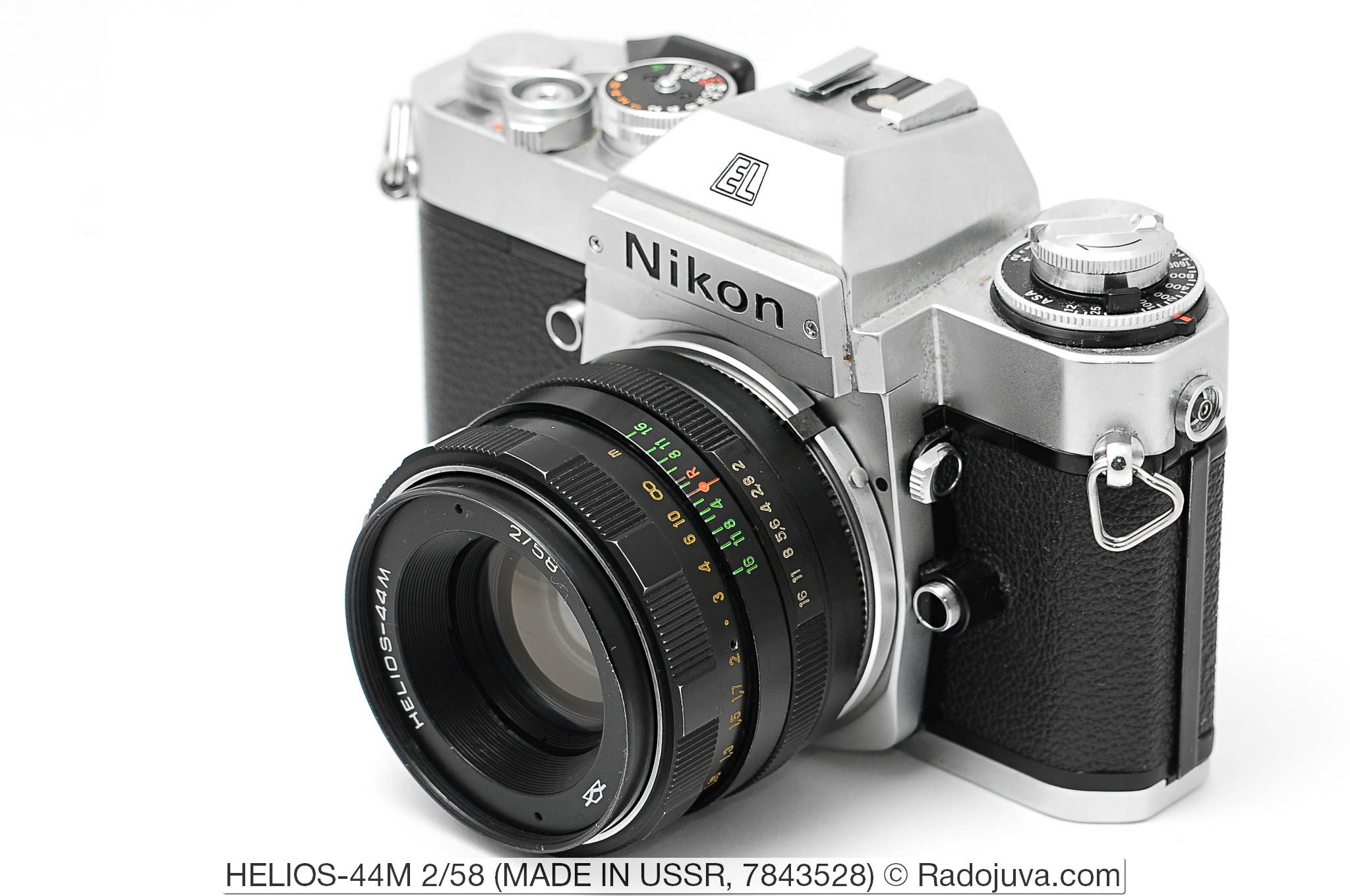 Обзор объектива HELIOS-44M 2/58 (КМЗ). Объектив показан на пленочной зеркальной камере Nikon EL2. Увеличить изображение. Установка объектива на фотоаппарат осуществлена с помощью переходника M42-Nikon F без чипа и линзы.